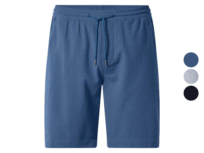 Shorts bleus texturés avec cordon de serrage, présentés avec des échantillons de couleurs bleu, rayé et noir.