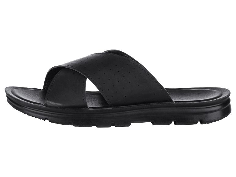 Sandales noires à brides croisées, semelle crantée.