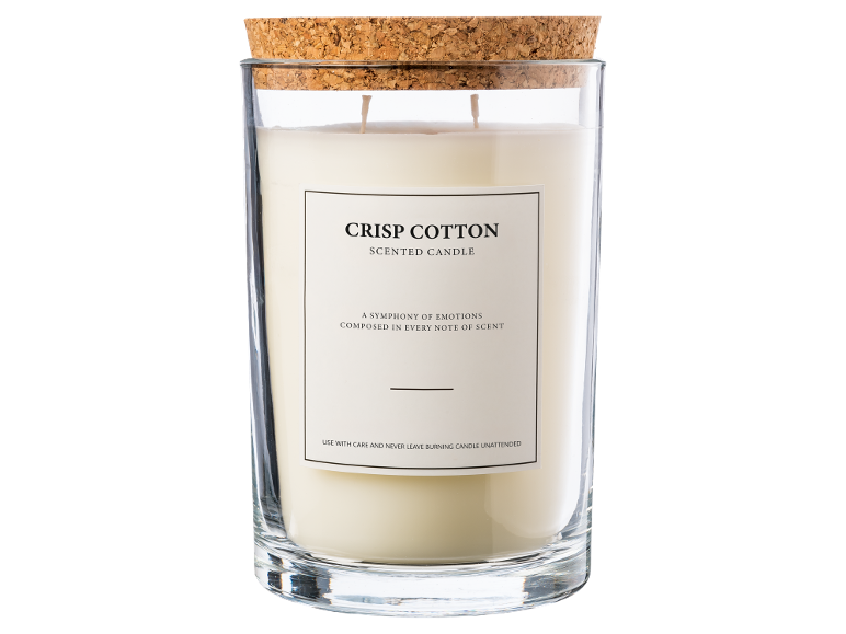 Bougie parfumée 'Crisp Cotton' dans un pot en verre avec couvercle en liège.