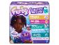 Boîte d'un jouet Furby violet avec différents modes de jeu.