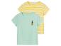 Deux t-shirts pour enfant : un vert clair avec ananas, un jaune rayé.
