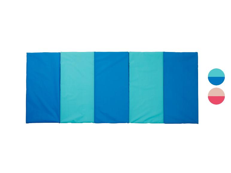Tapis d'exercice pliable bleu et turquoise avec échantillons de couleurs.