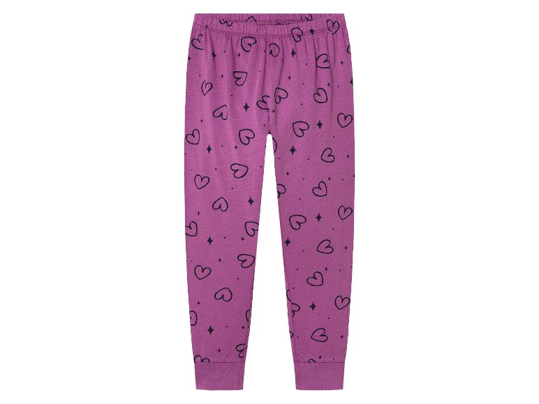 Pyjama enfant rose à motifs cœurs.