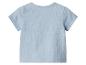 T-shirt bébé bleu clair à manches courtes en tissu texturé, vue de dos.