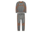 Un pantalon de survêtement gris avec des détails orange.