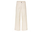 Pantalon blanc large avec des franges.