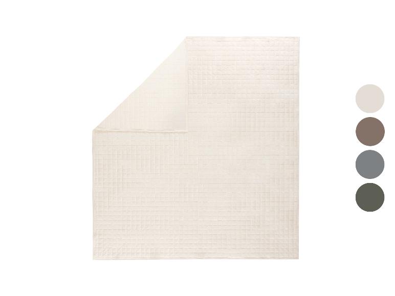 Couverture gaufrée crème avec échantillons de couleurs.