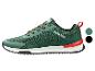 Chaussure de sport verte avec lacets rouges et semelle blanche, avec le texte 'PARKSIDE'.