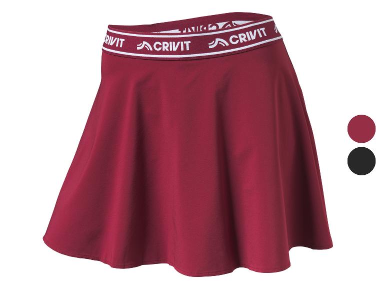 Jupe de sport bordeaux pour femme avec taille élastique portant l'inscription « CRIVIT ».