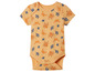Un body bébé jaune avec un motif de poulpes et de crabes.