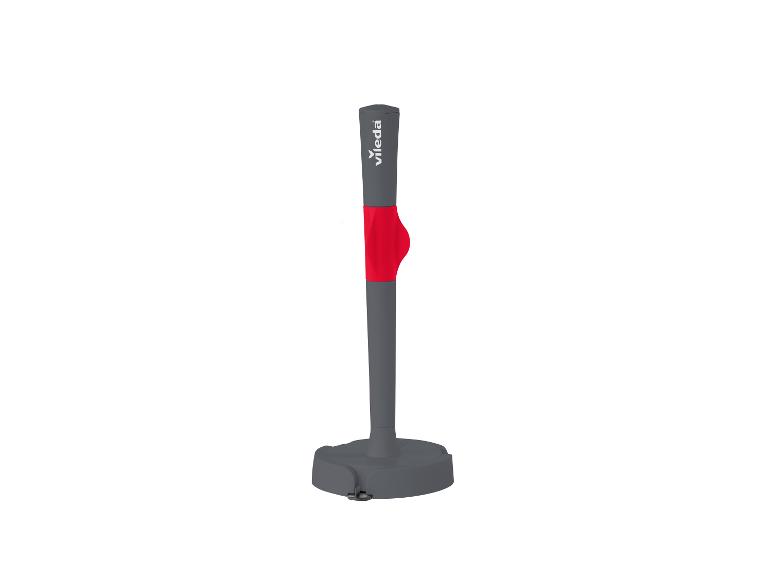 Poteau de signalisation gris et rouge avec base