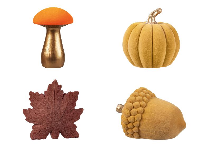 Collection d'objets décoratifs d'automne : champignon, citrouille, feuille et gland.