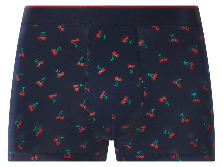 Caleçon pour homme bleu marine avec motif cerises rouges et ceinture rayée rouge.
