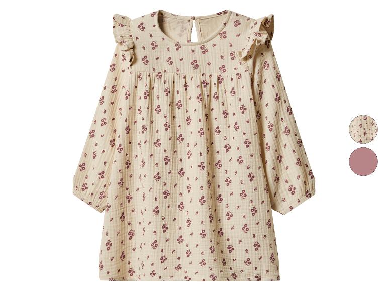 Robe enfant beige à manches longues avec motif floral violet.
