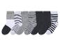 Six paires de chaussettes pour enfants, rayées et unies.