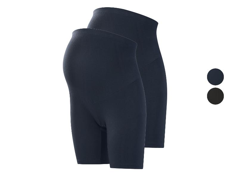 Deux paires de shorts de cyclisme de maternité bleu foncé et noir.