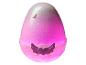 Œuf rose et blanc pailleté avec une fissure, posé sur une base décorative avec un cœur ailé.