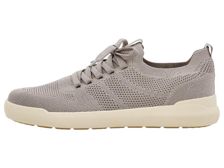 Chaussures de sport grises en tricot avec lacets et semelle beige.