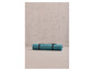 Un tapis de yoga bleu de la marque 