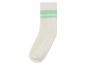 Une chaussette blanche avec des rayures vertes.