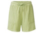 Shorts en tissu éponge vert avec cordon.