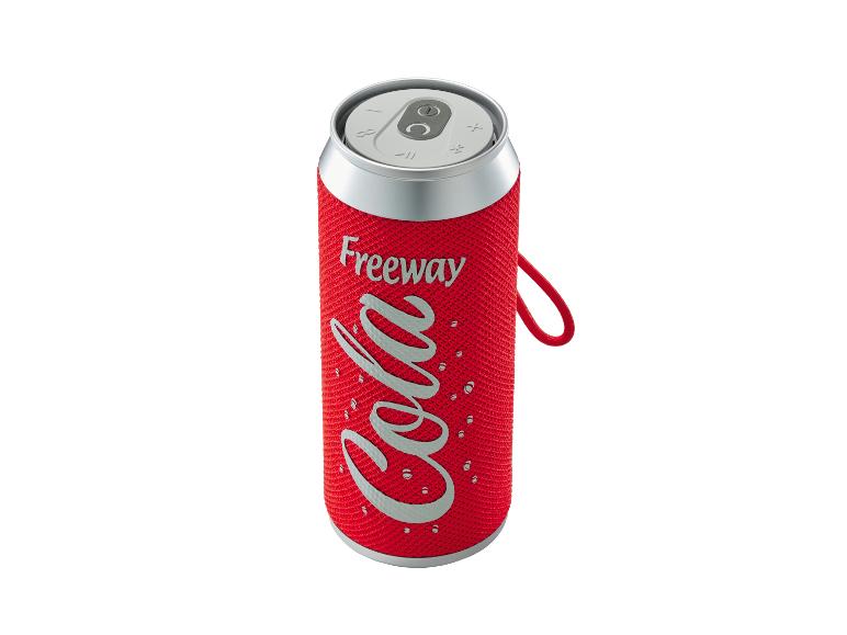 Enceinte portable rouge en forme de canette de soda avec le texte 'Freeway Cola' et une anse.