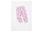Pantalon de jogging rose à motifs cœurs pour enfant.