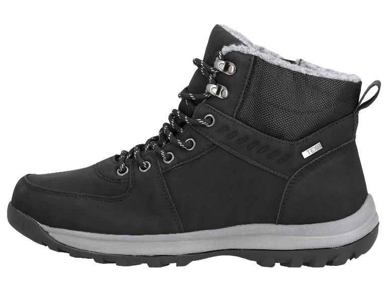 Bottes d'hiver noires avec lacets et semelle grise.