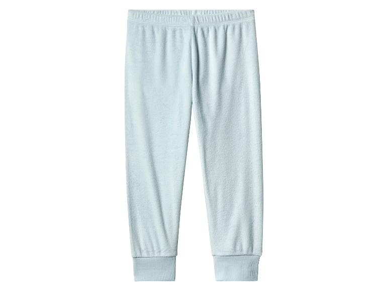 Pantalon de pyjama en polaire bleu clair avec poignets élastiques.