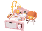 Ensemble de jeu rose pour bébé avec berceau, chaise et accessoires.