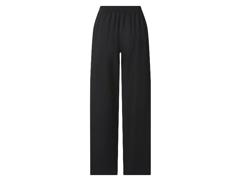 Pantalon large noir avec taille élastique.
