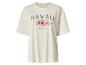 T-shirt crème avec texte 'HAWAII EST. 1959 ALOHA' et fleurs d'hibiscus roses