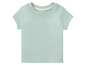 Un t-shirt bébé vert clair à manches courtes.