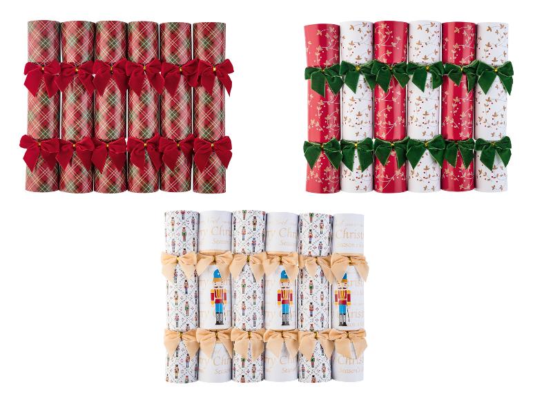 LIVARNO® Party Konfetti Knaller: trois ensembles de crackers de Noël avec nœuds et motifs festifs.