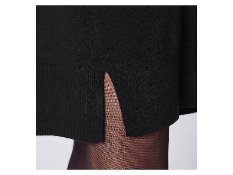 Pull noir avec fente latérale et collants