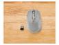 Souris sans fil Tronic et récepteur USB sur fond bois.