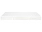 Un matelas blanc avec une surface ondulée.