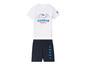 T-shirt blanc avec imprimé Krypto le Superchien et short bleu avec logos Superman.