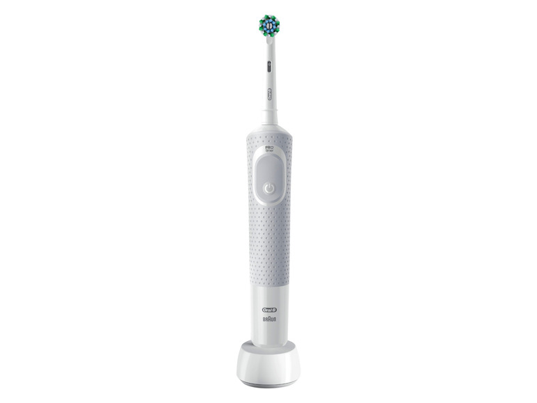Une brosse à dents électrique Oral-B blanche avec station de charge.