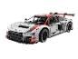 Un modèle Lego blanc d'une voiture de course Audi Sport.