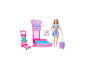 Coffret de jeu Barbie avec poupée, tapis à bagages et valise.