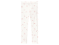 Leggings enfant blanches à motifs cœurs roses.