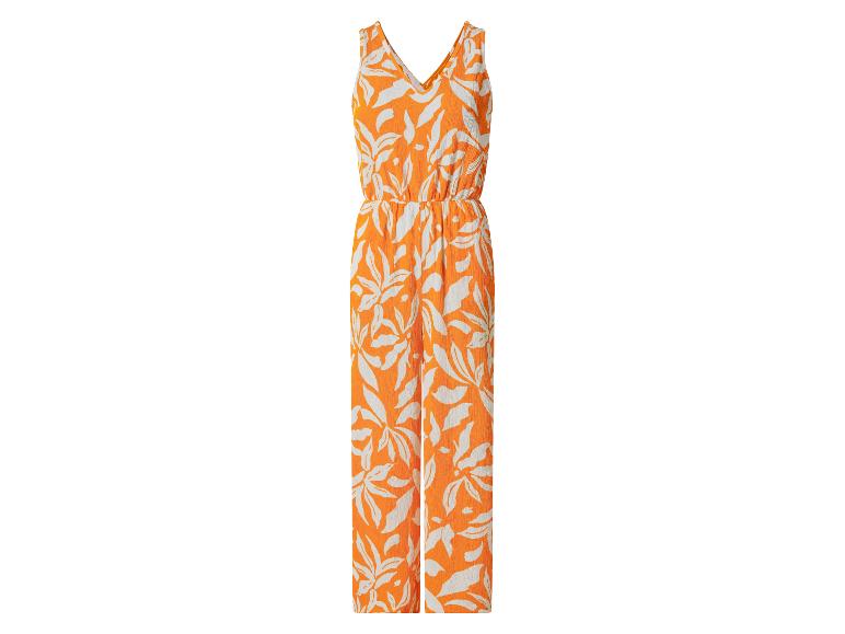 Combinaison femme orange à imprimé feuilles blanches.