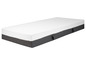 Un matelas blanc avec une housse grise et des poignées.