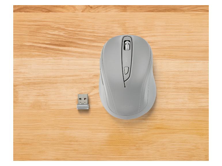 Souris sans fil TRONIC grise et récepteur USB sur une table en bois.