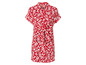 Une robe rouge à imprimé blanc et nœud