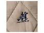 Cavalier brodé sur cheval sur tissu matelassé beige