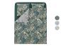 Parure de lit avec motif feuilles tropicales dans les tons verts, marrons et bleus.