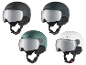 Quatre casques de ski et snowboard CRIVIT avec visière photochromique en noir, vert foncé, turquoise et blanc.