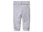 Pantalon bébé côtelé gris clair avec taille élastique.